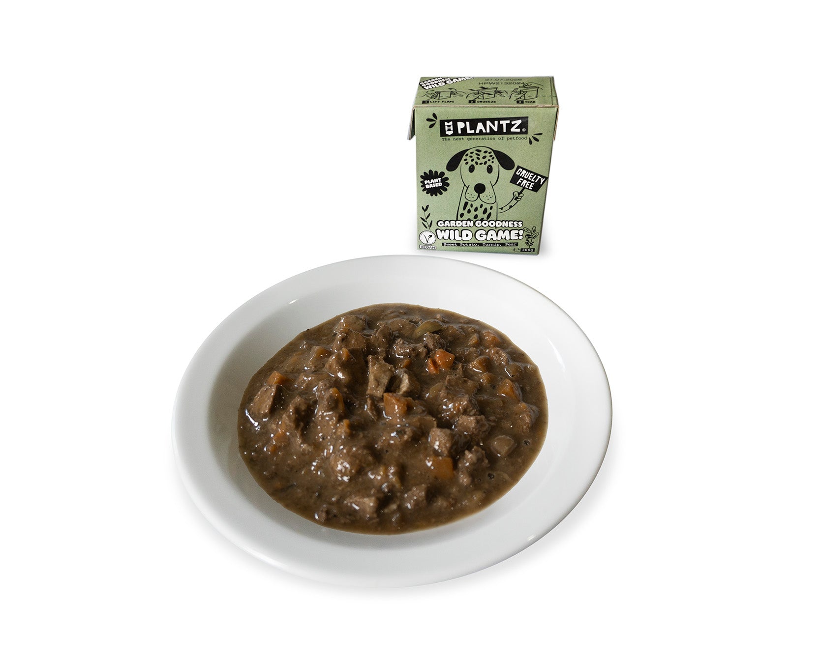 Pflanzenbasiertes Nassfutter mit Wild Geschmack auf dem Teller vegan